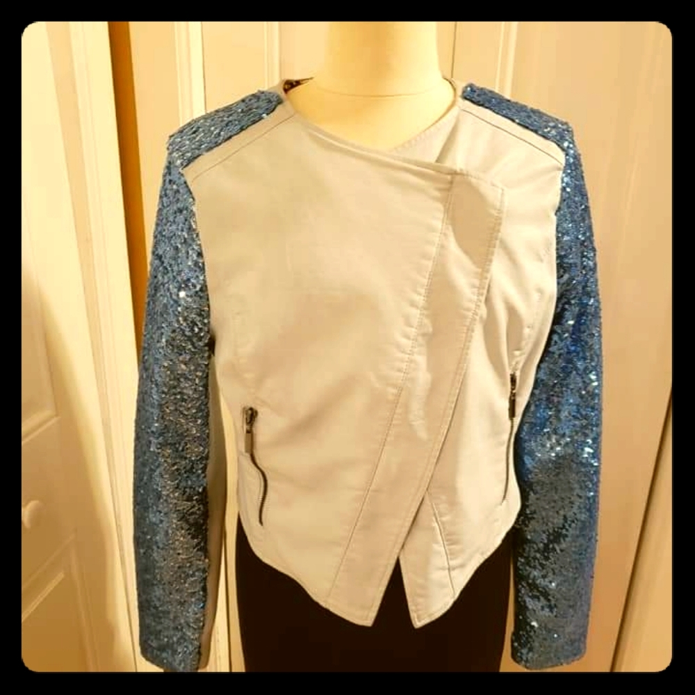 Sequence and leather jacket.
